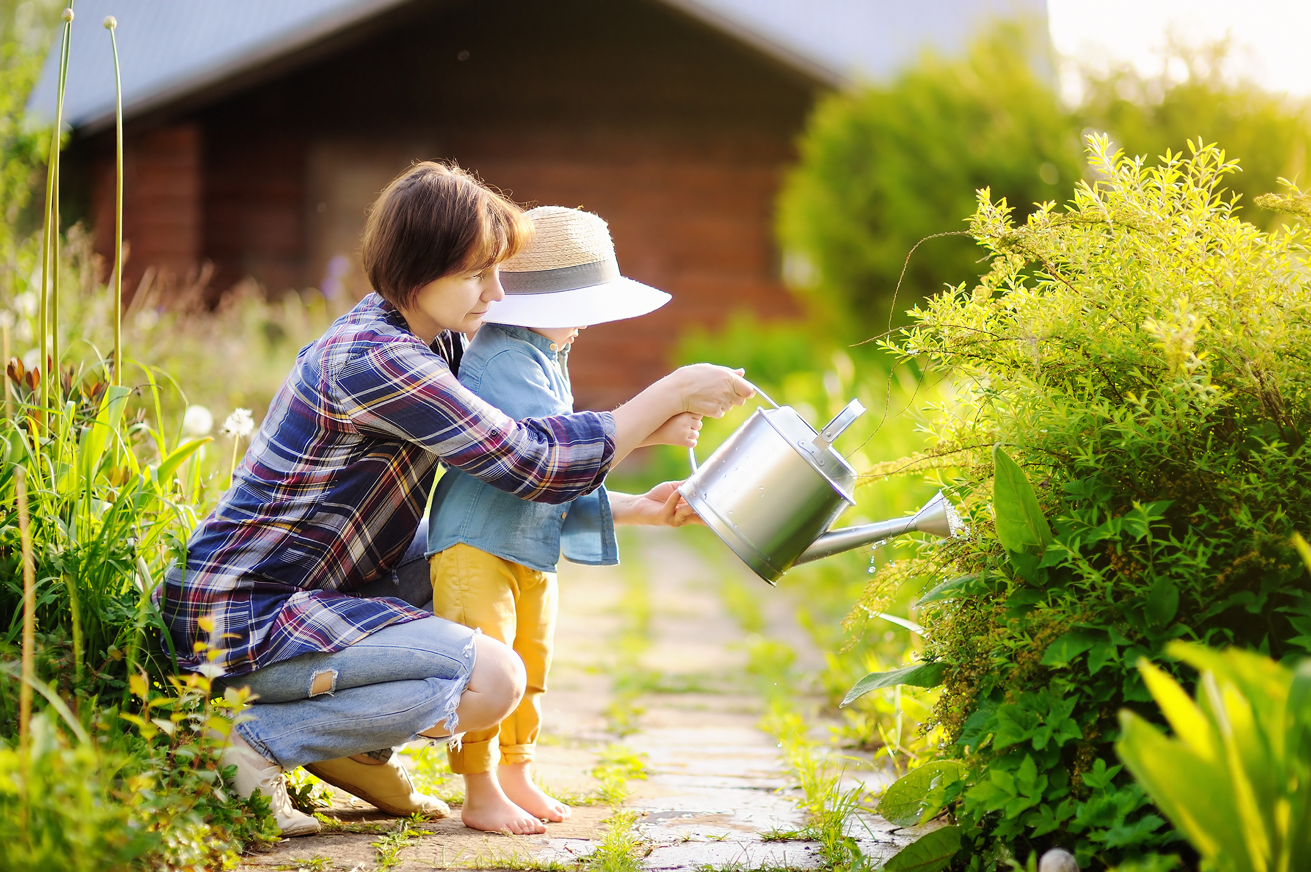 Parent and child in spring garden