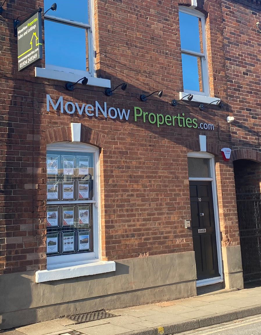 Photo of the front of the MoveNow properties shop