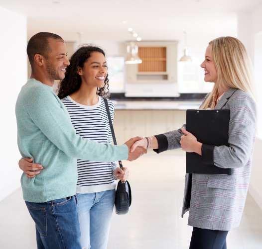 Shaking the hands of husband & wife whilst viewing a property